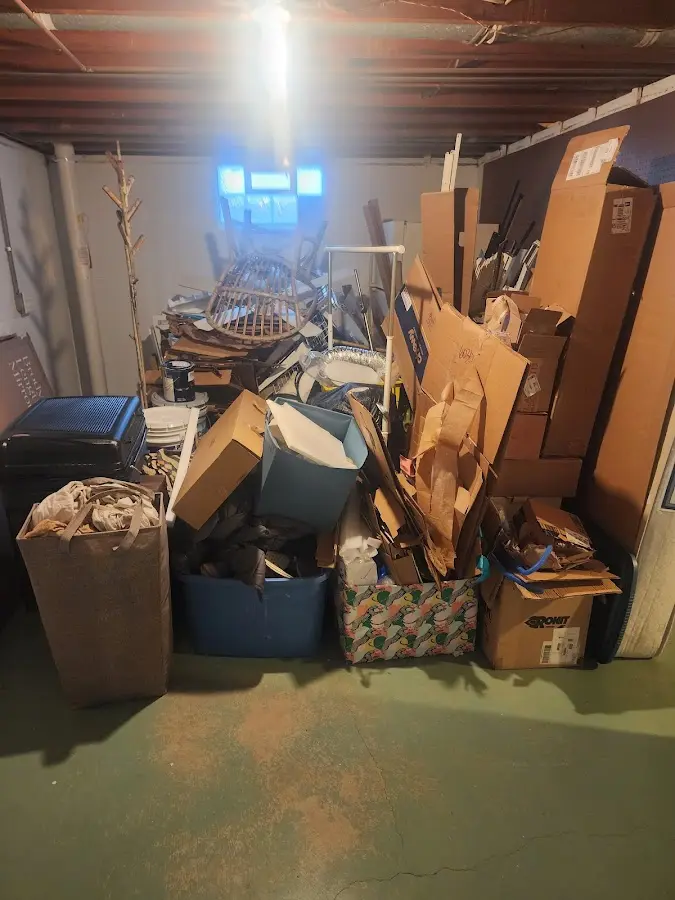 Roll-off dumpster container at job site for 15 Yard Dumpster Rental in Lakeland North